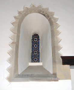 Norman window in the south wall of the chancel February 2011
